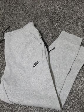 Nike Grey Kids Fleece Joggers with Black Swoosh